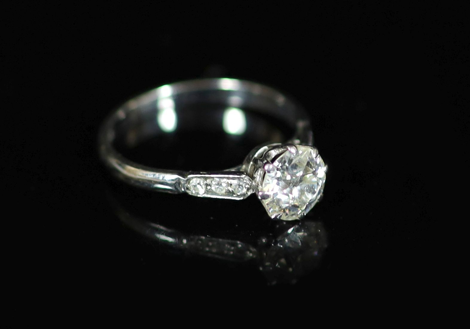 An 18ct white gold and single stone diamond ring